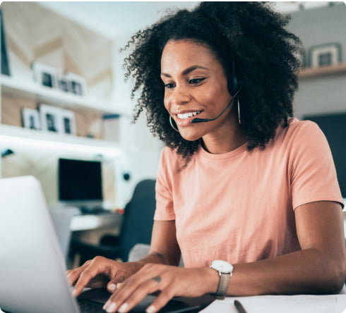 a young woman working on a laptop