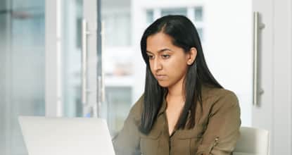 a woman working on a laptop