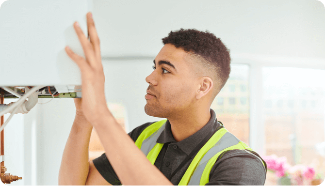 A young male from HVAC industry wearing safety gears.