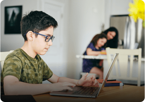 a student working on a laptop