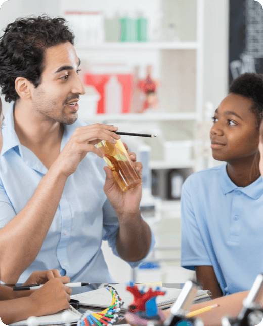 a young teacher teaching to a group of children