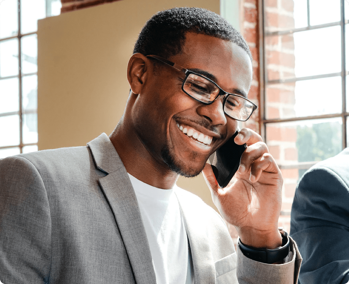 Man in a blazer on a call